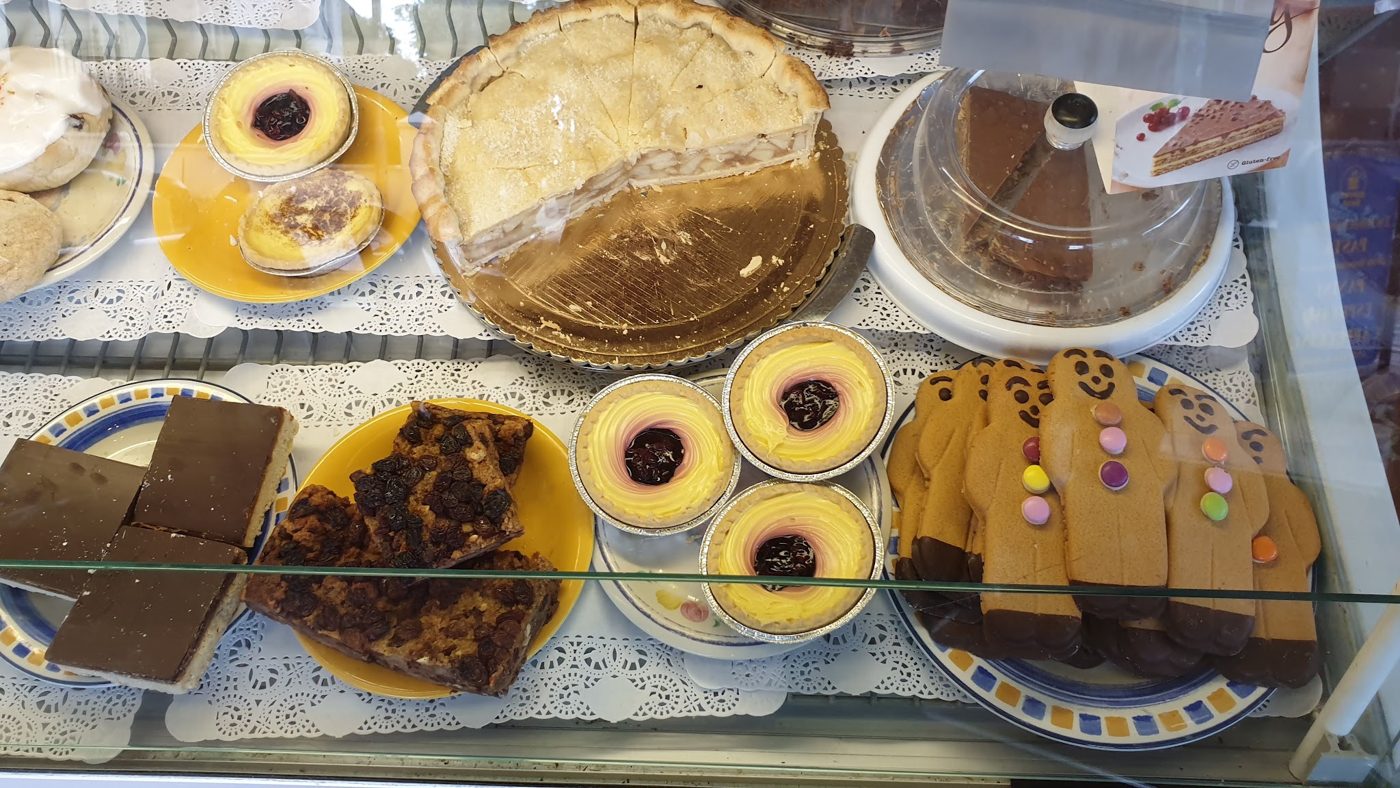 Tarts, cakes and slices in the counter cabinet